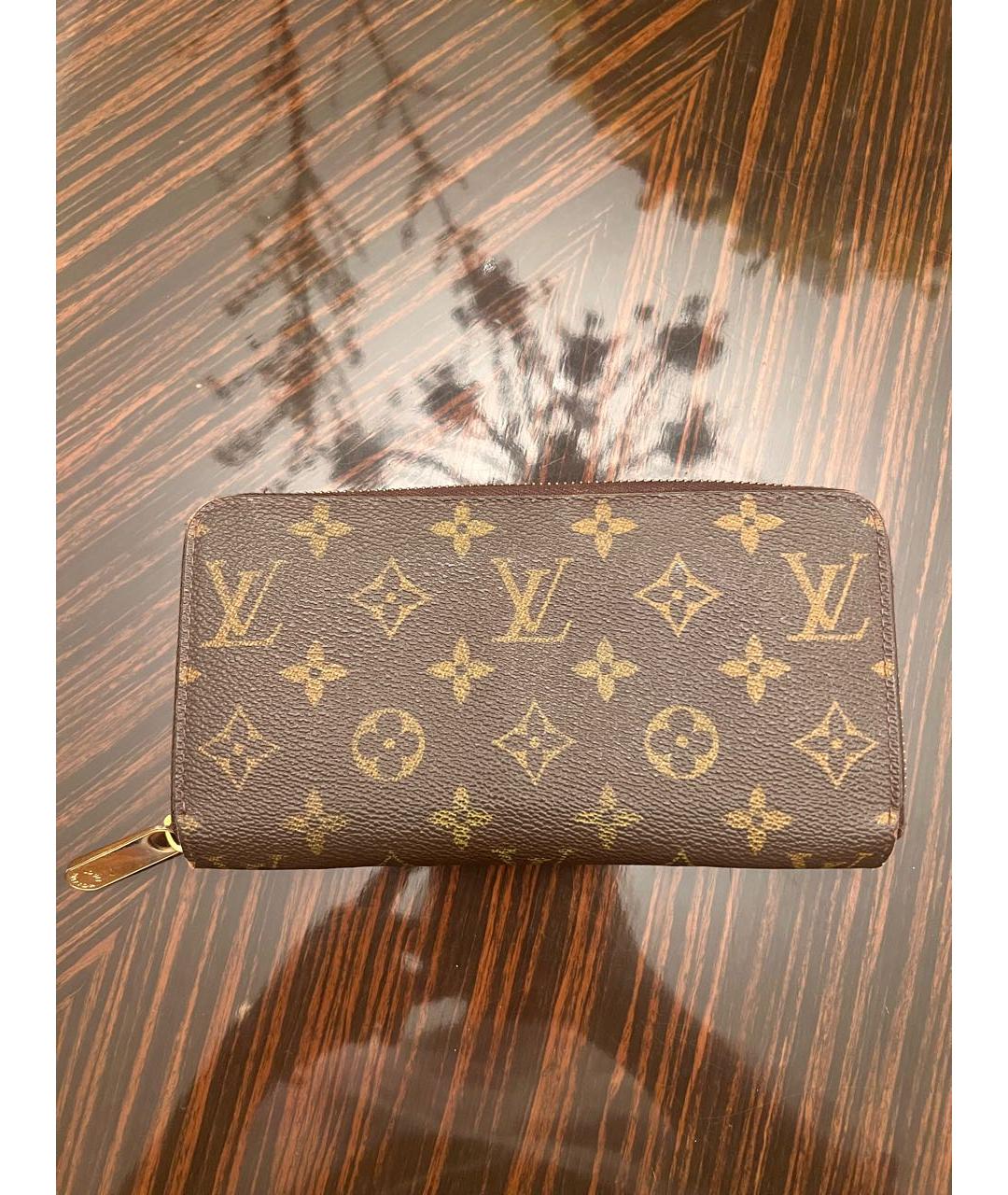 LOUIS VUITTON Коричневый кожаный кошелек, фото 4