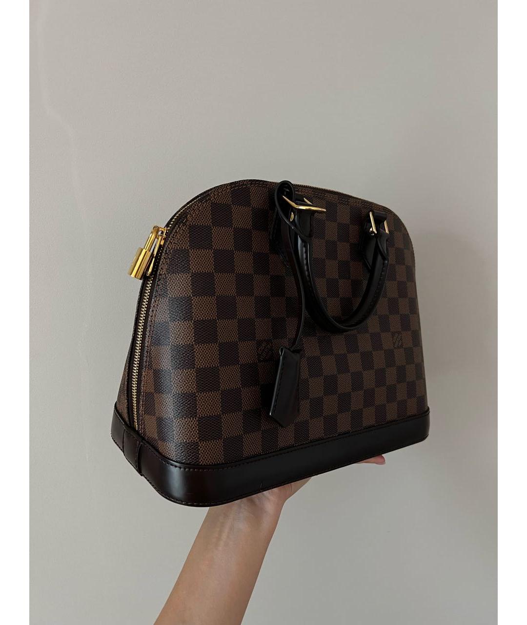 LOUIS VUITTON Кожаная сумка с короткими ручками, фото 2