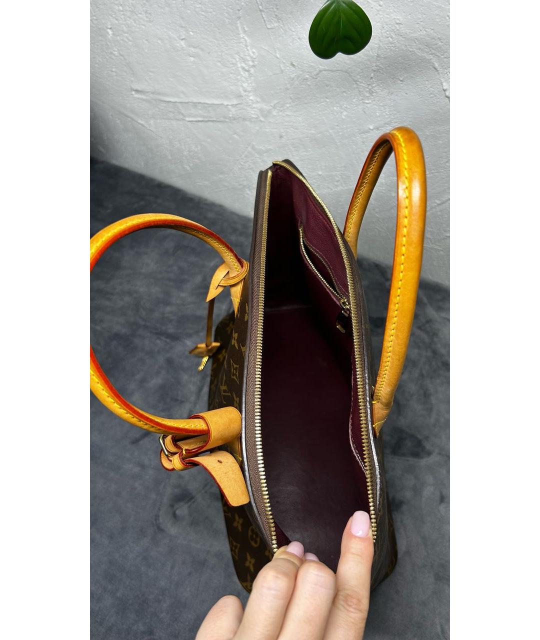 LOUIS VUITTON Коричневая кожаная сумка с короткими ручками, фото 3