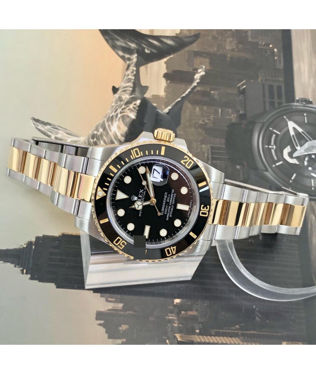 ROLEX Черные часы из желтого золота, фото 2