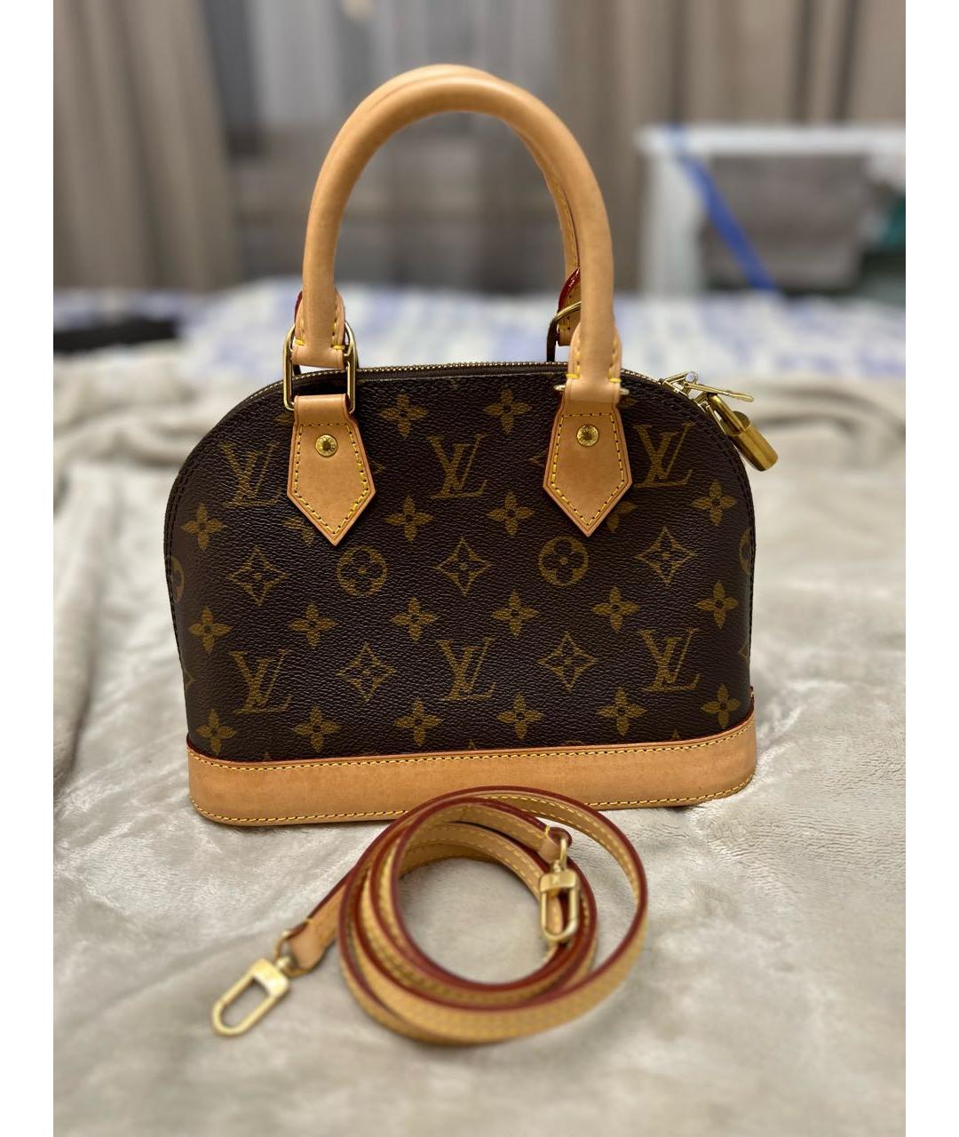 LOUIS VUITTON Коричневая кожаная сумка с короткими ручками, фото 3