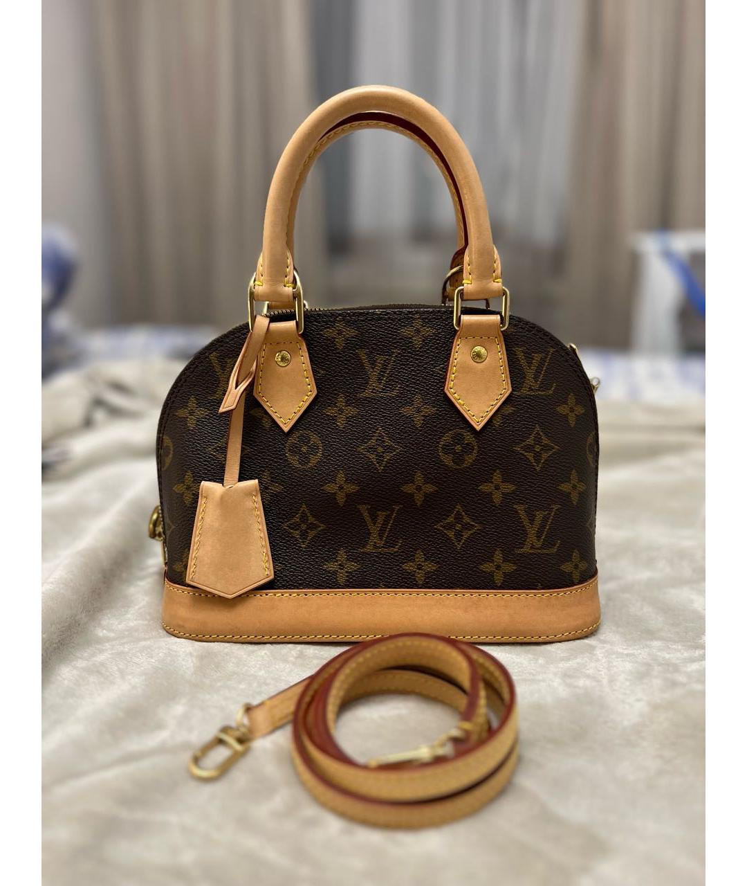 LOUIS VUITTON Коричневая кожаная сумка с короткими ручками, фото 9