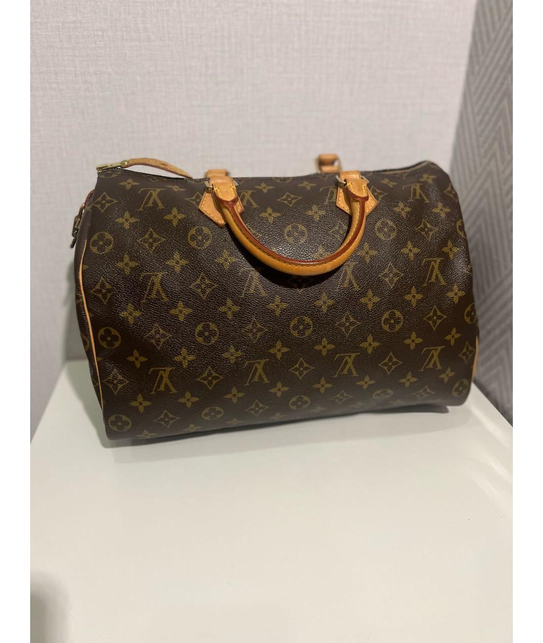 LOUIS VUITTON Коричневая кожаная сумка с короткими ручками, фото 7