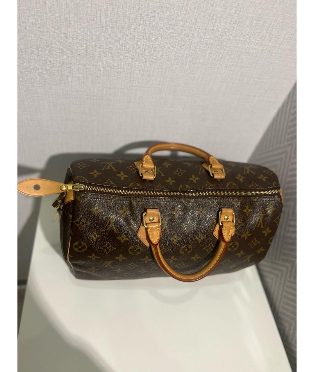 LOUIS VUITTON Коричневая кожаная сумка с короткими ручками, фото 4