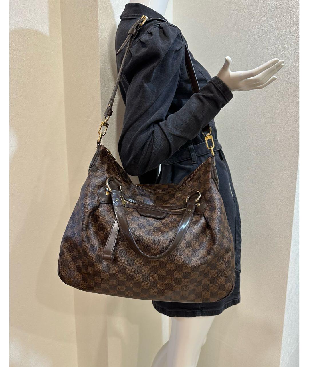 LOUIS VUITTON Коричневая кожаная сумка с короткими ручками, фото 4