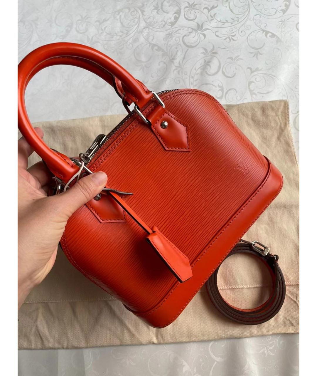 LOUIS VUITTON Оранжевая кожаная сумка с короткими ручками, фото 3