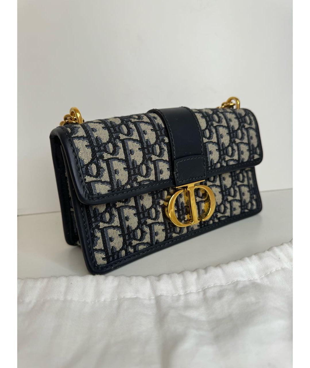 Dior oblique clutch price best sale