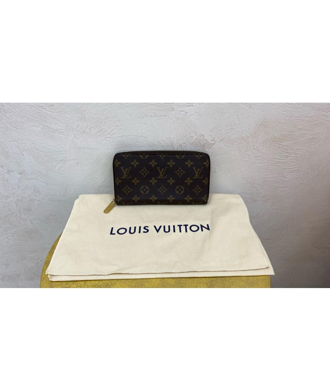 LOUIS VUITTON PRE-OWNED Коричневый кожаный кошелек, фото 2