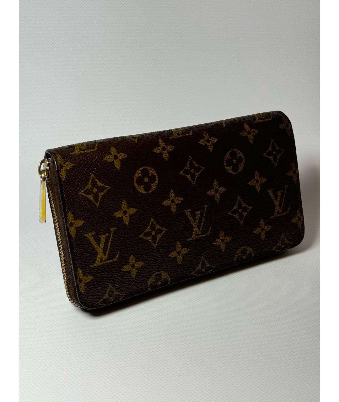 LOUIS VUITTON Коричневый кожаный кошелек, фото 9