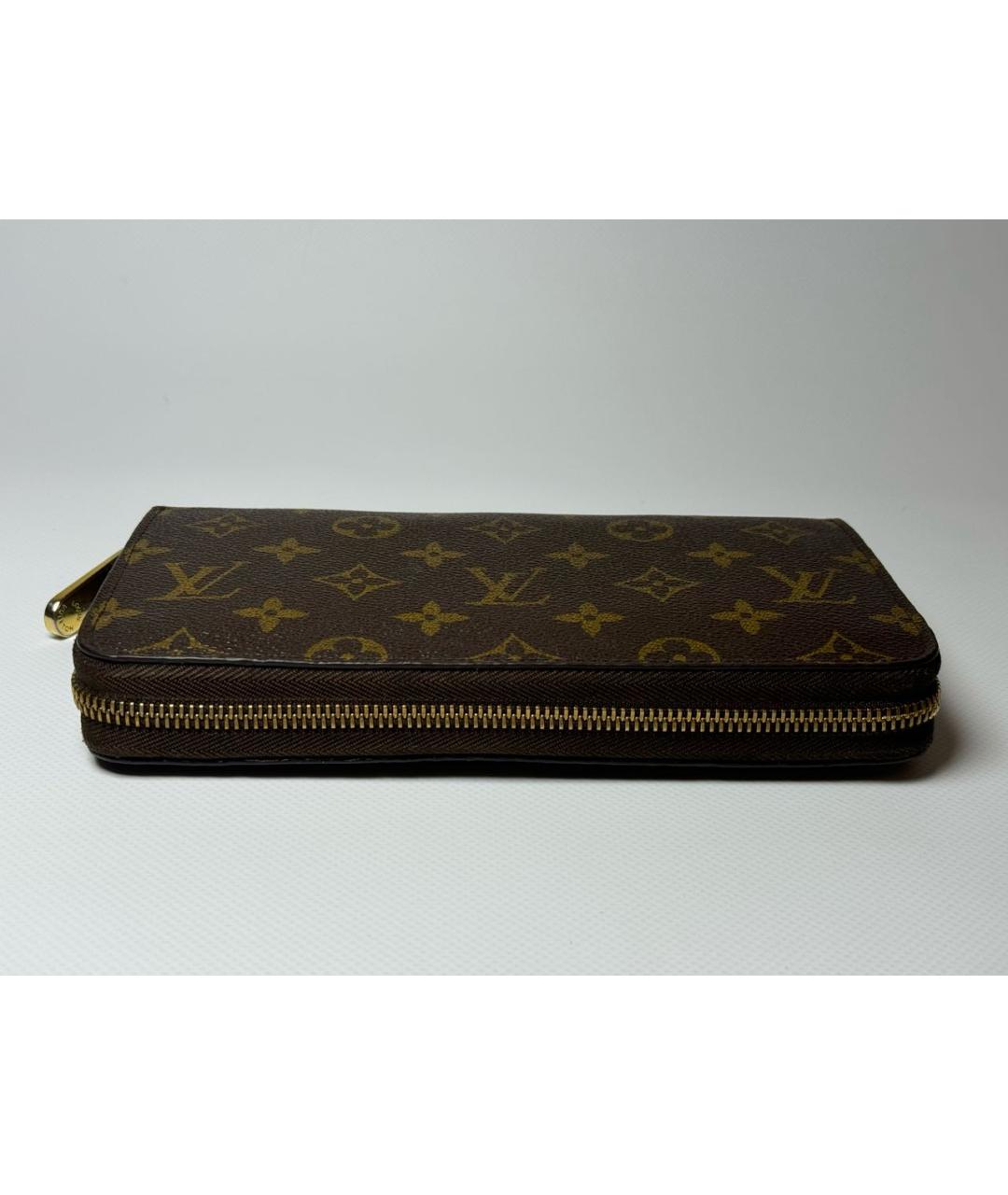 LOUIS VUITTON Коричневый кожаный кошелек, фото 6