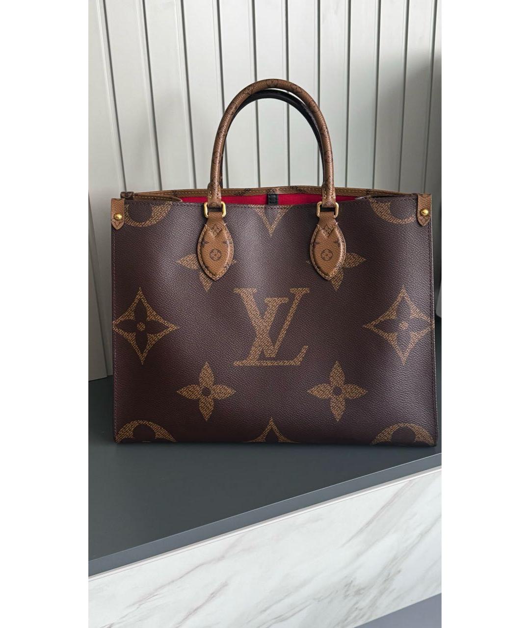 LOUIS VUITTON Коричневая кожаная сумка с короткими ручками, фото 9