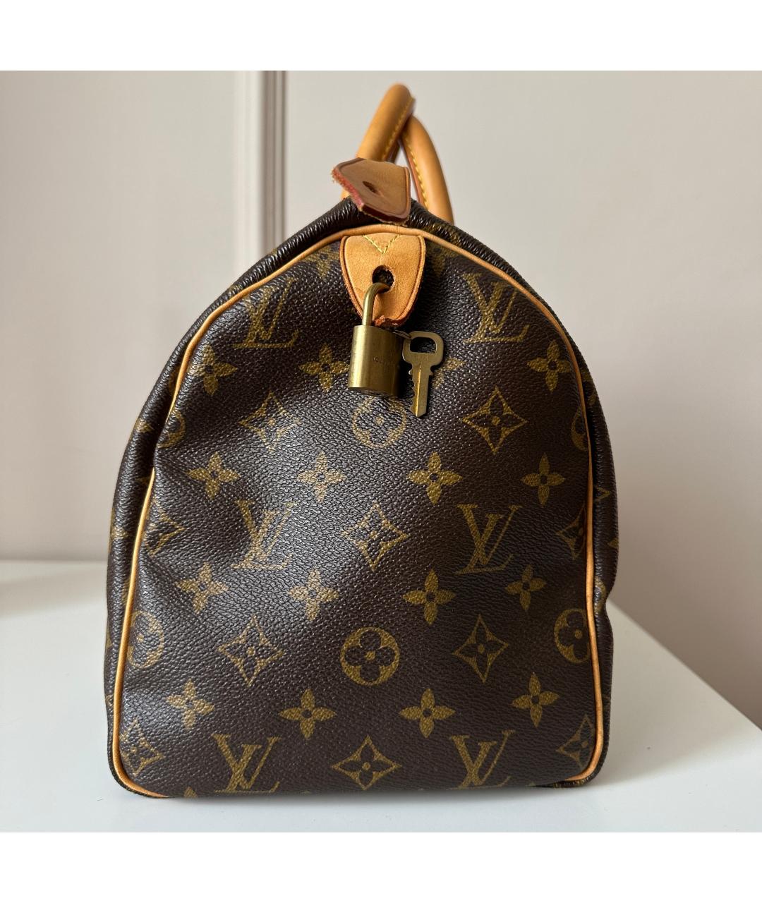 LOUIS VUITTON Коричневая кожаная сумка с короткими ручками, фото 4