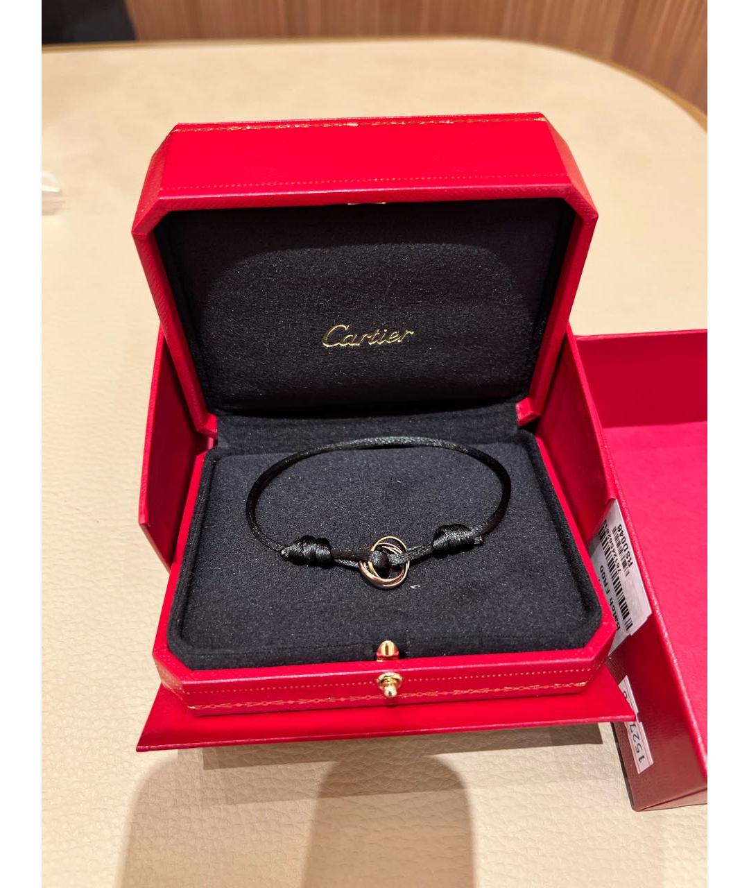 CARTIER Черный браслет из желтого золота, фото 3