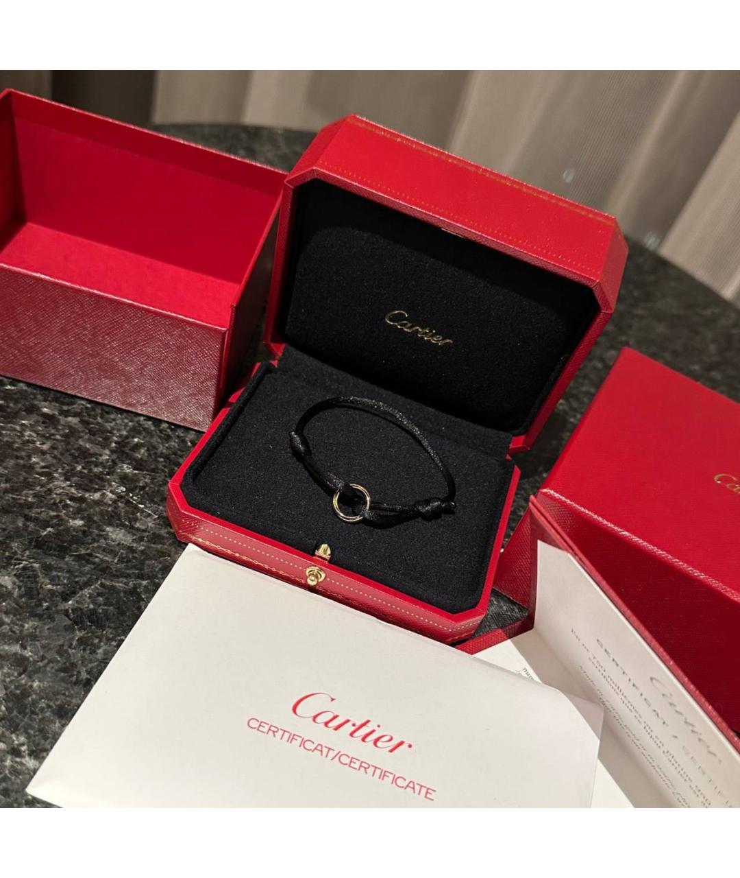 CARTIER Черный браслет из желтого золота, фото 2