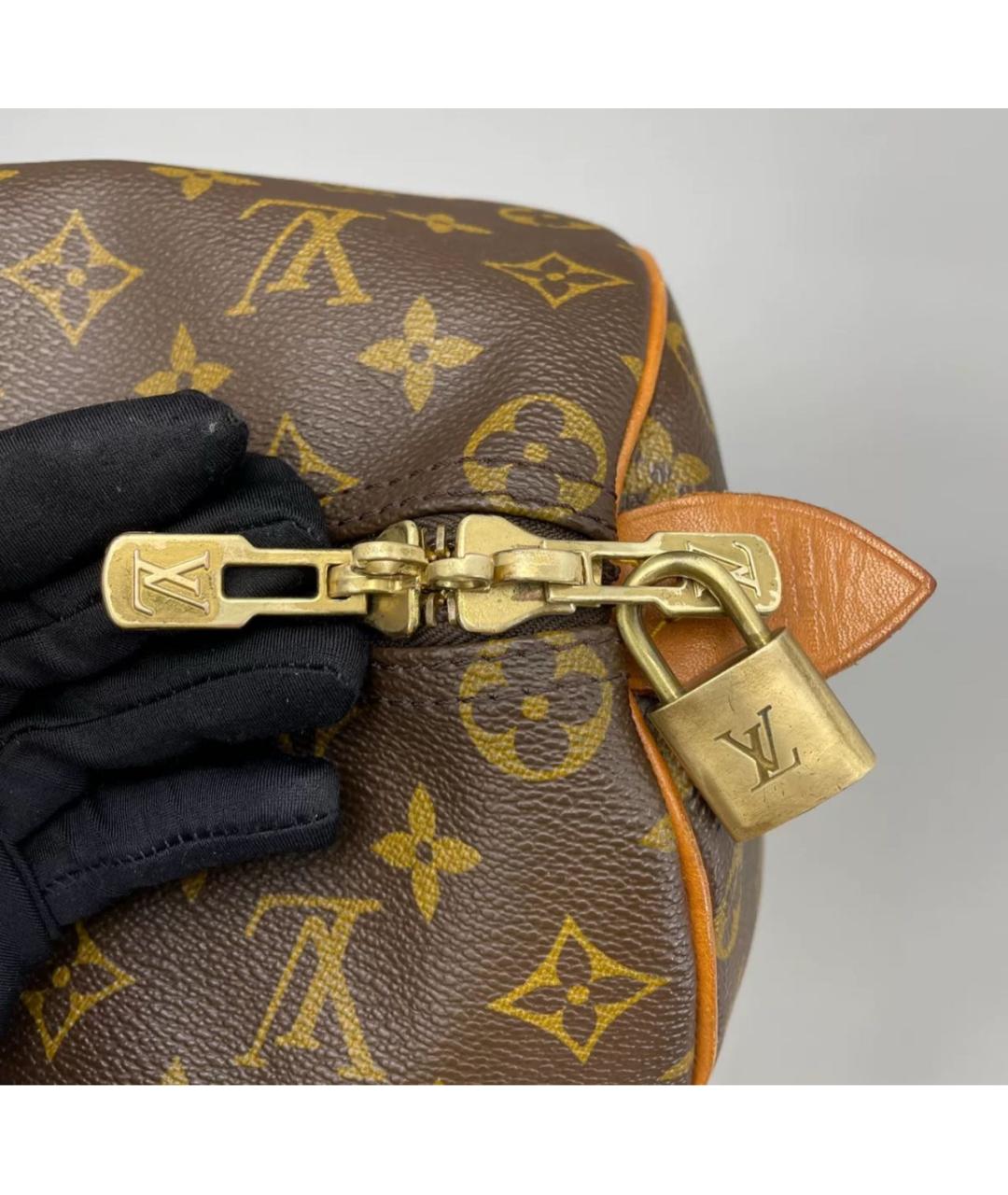 LOUIS VUITTON Коричневая кожаная дорожная/спортивная сумка, фото 6