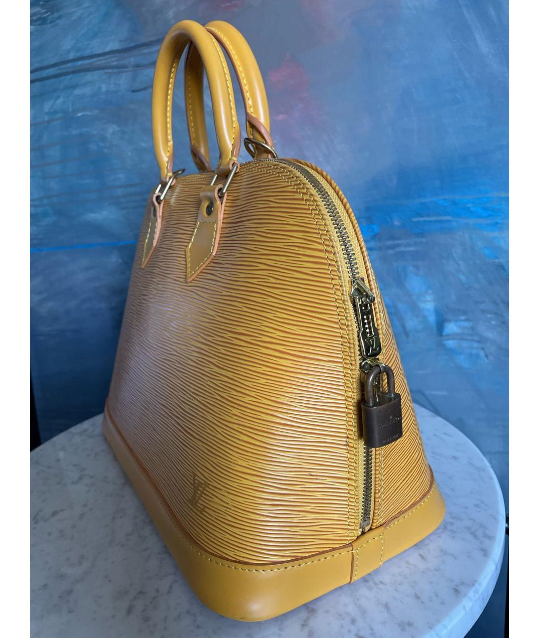 LOUIS VUITTON Желтая кожаная сумка с короткими ручками, фото 3