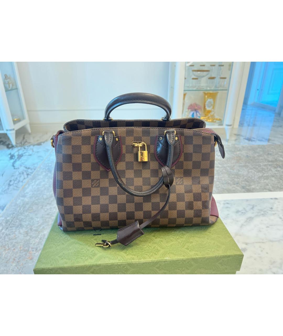 LOUIS VUITTON Коричневая кожаная сумка с короткими ручками, фото 9