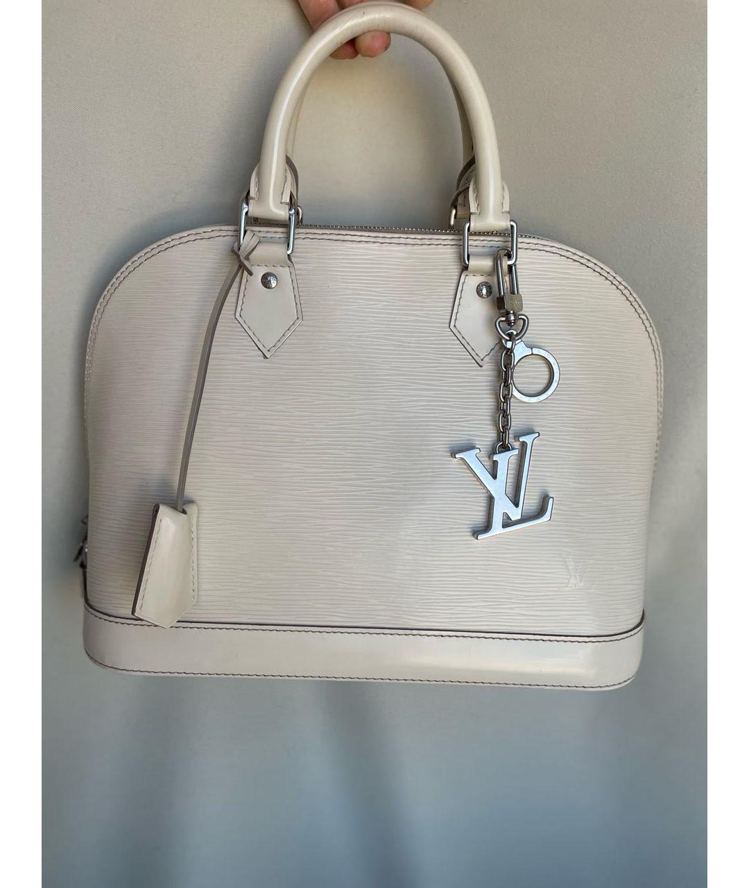 LOUIS VUITTON Кожаная сумка с короткими ручками, фото 9