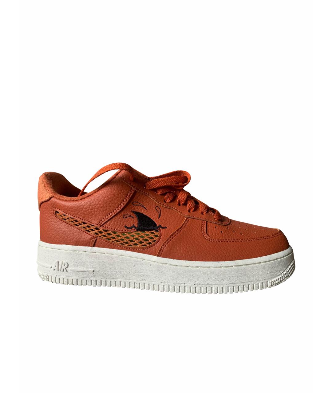NIKE Оранжевое низкие кроссовки / кеды из искусственной кожи, фото 1