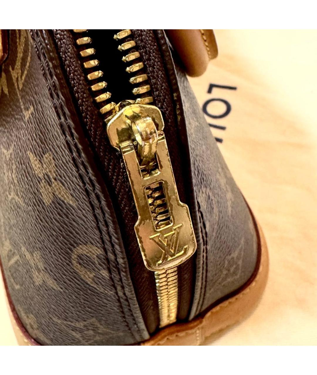 LOUIS VUITTON Коричневая кожаная сумка с короткими ручками, фото 5