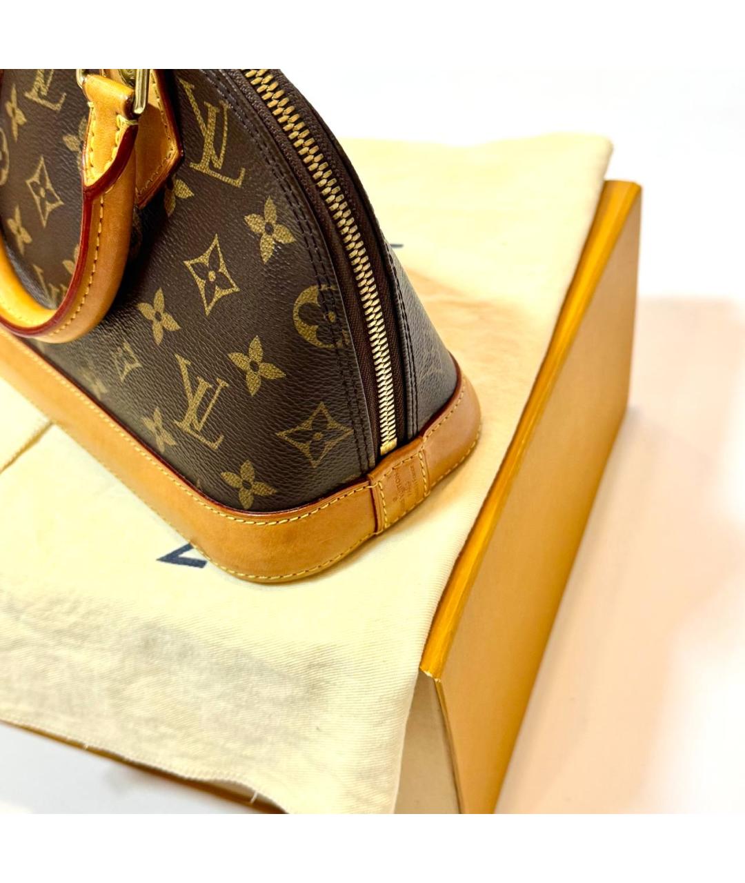 LOUIS VUITTON Коричневая кожаная сумка с короткими ручками, фото 3