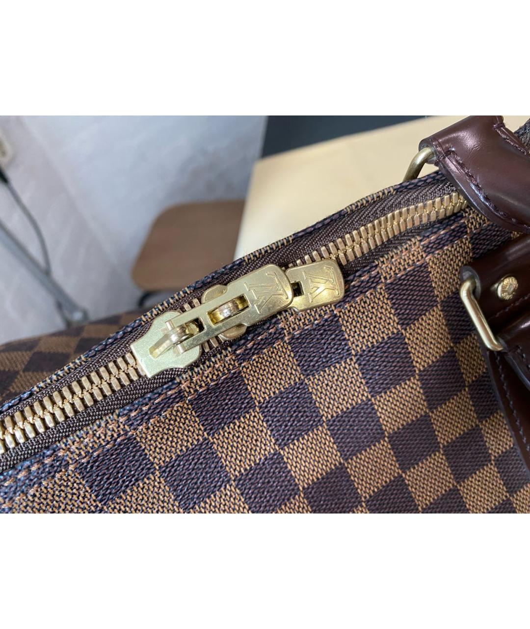 LOUIS VUITTON Коричневая кожаная дорожная/спортивная сумка, фото 6