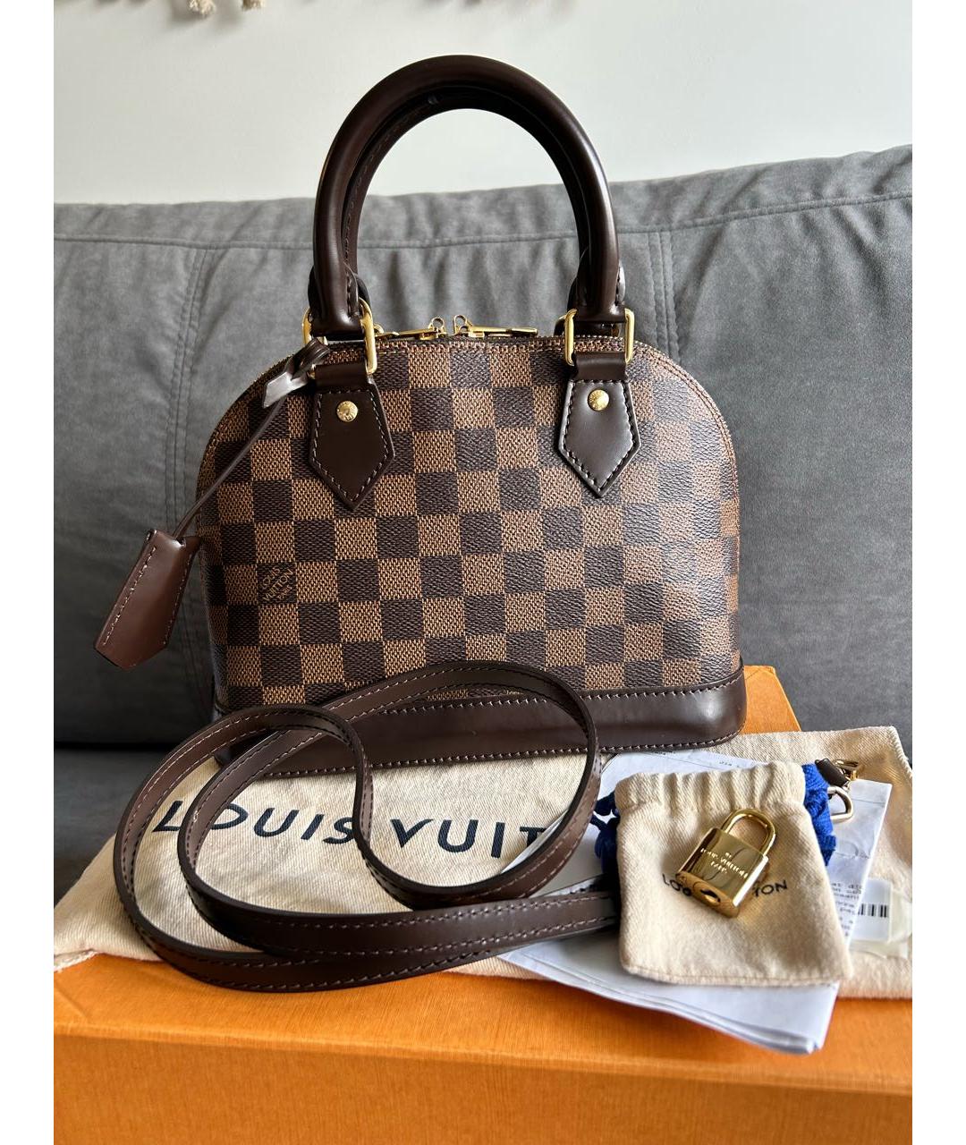 LOUIS VUITTON Коричневая кожаная сумка с короткими ручками, фото 9