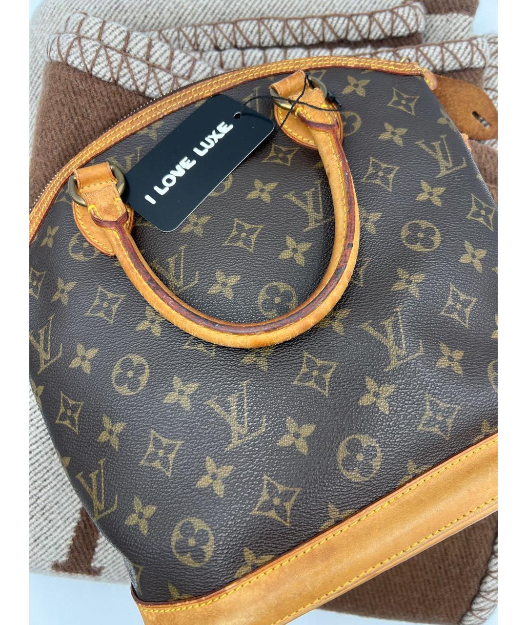 LOUIS VUITTON Коричневая кожаная сумка с короткими ручками, фото 3