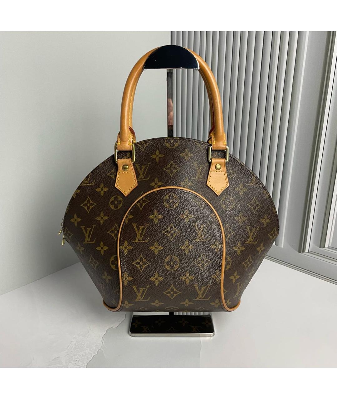 LOUIS VUITTON Коричневая кожаная сумка с короткими ручками, фото 9
