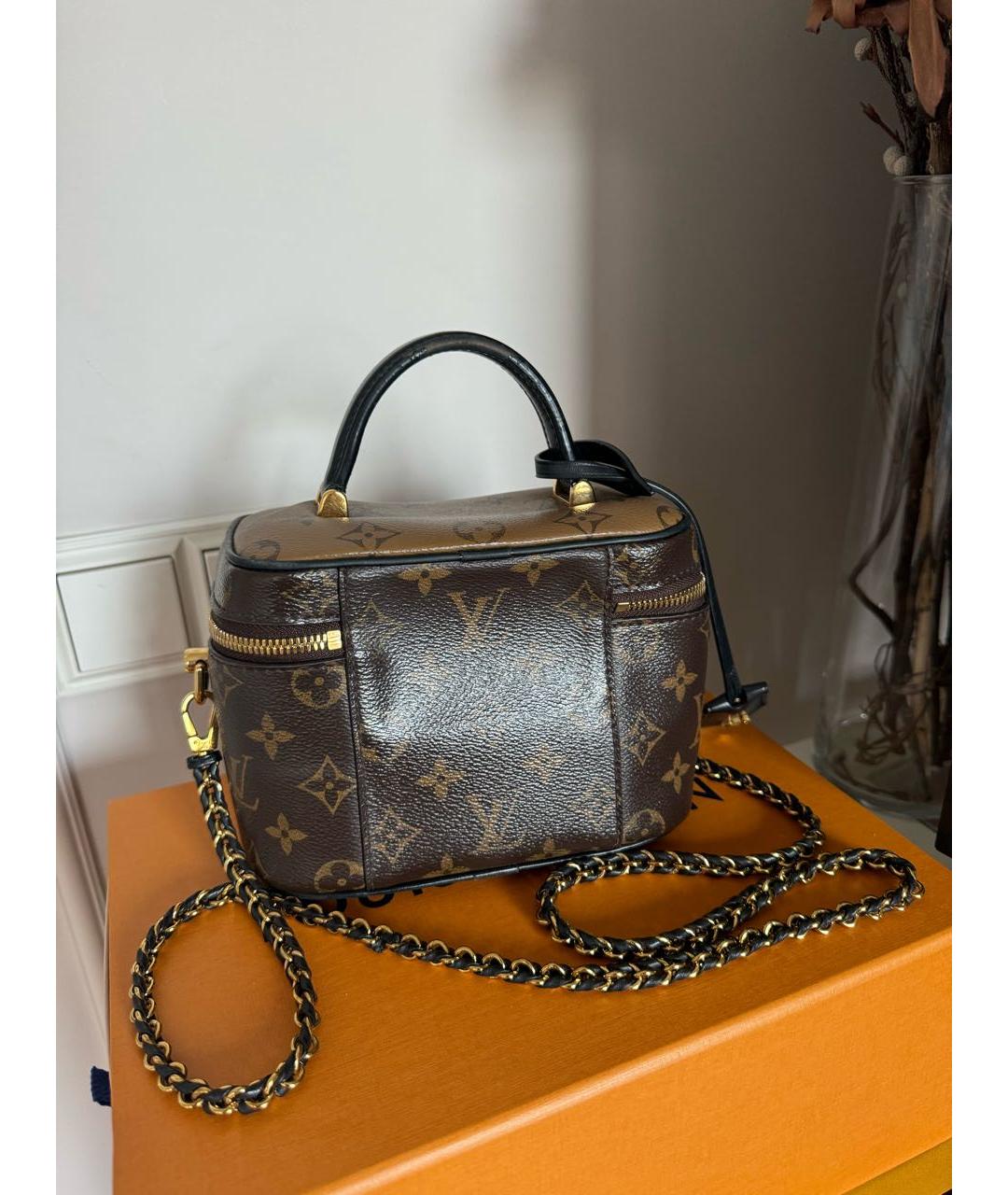 LOUIS VUITTON Коричневая кожаная сумка с короткими ручками, фото 3