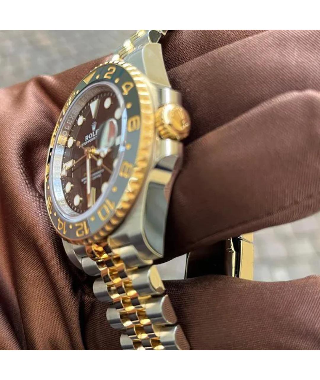 ROLEX Черные часы из желтого золота, фото 2