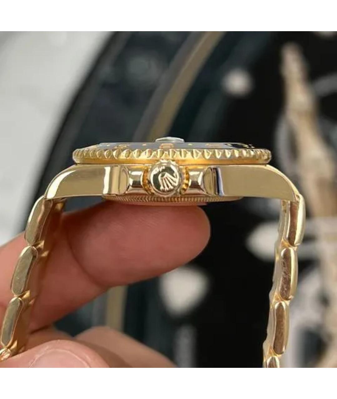 ROLEX Черные часы из желтого золота, фото 2