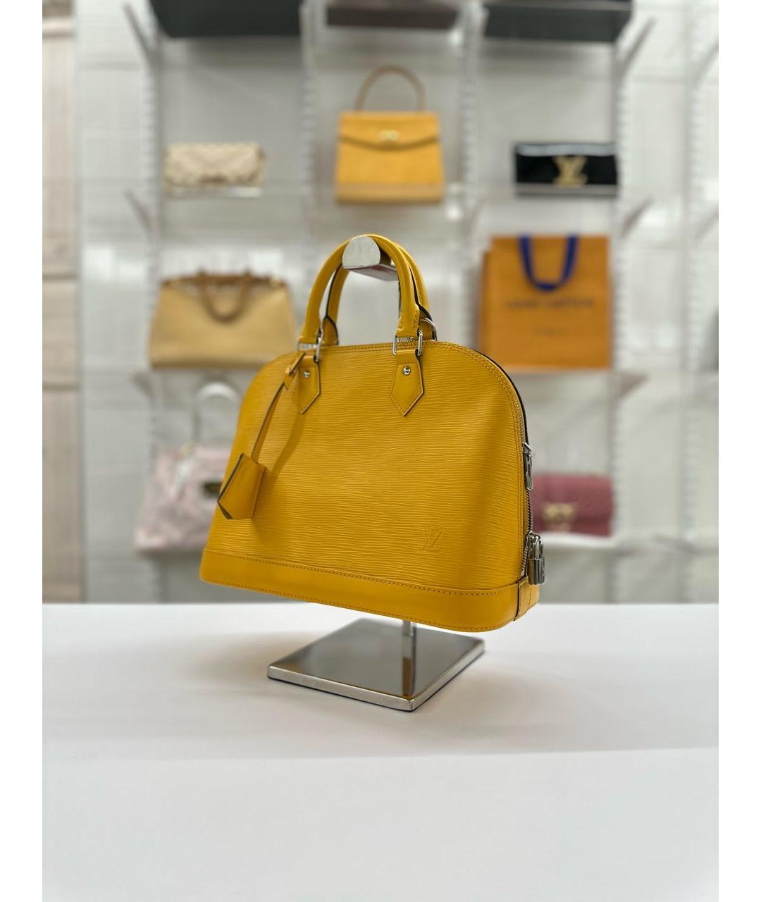 LOUIS VUITTON Кожаная сумка с короткими ручками, фото 2