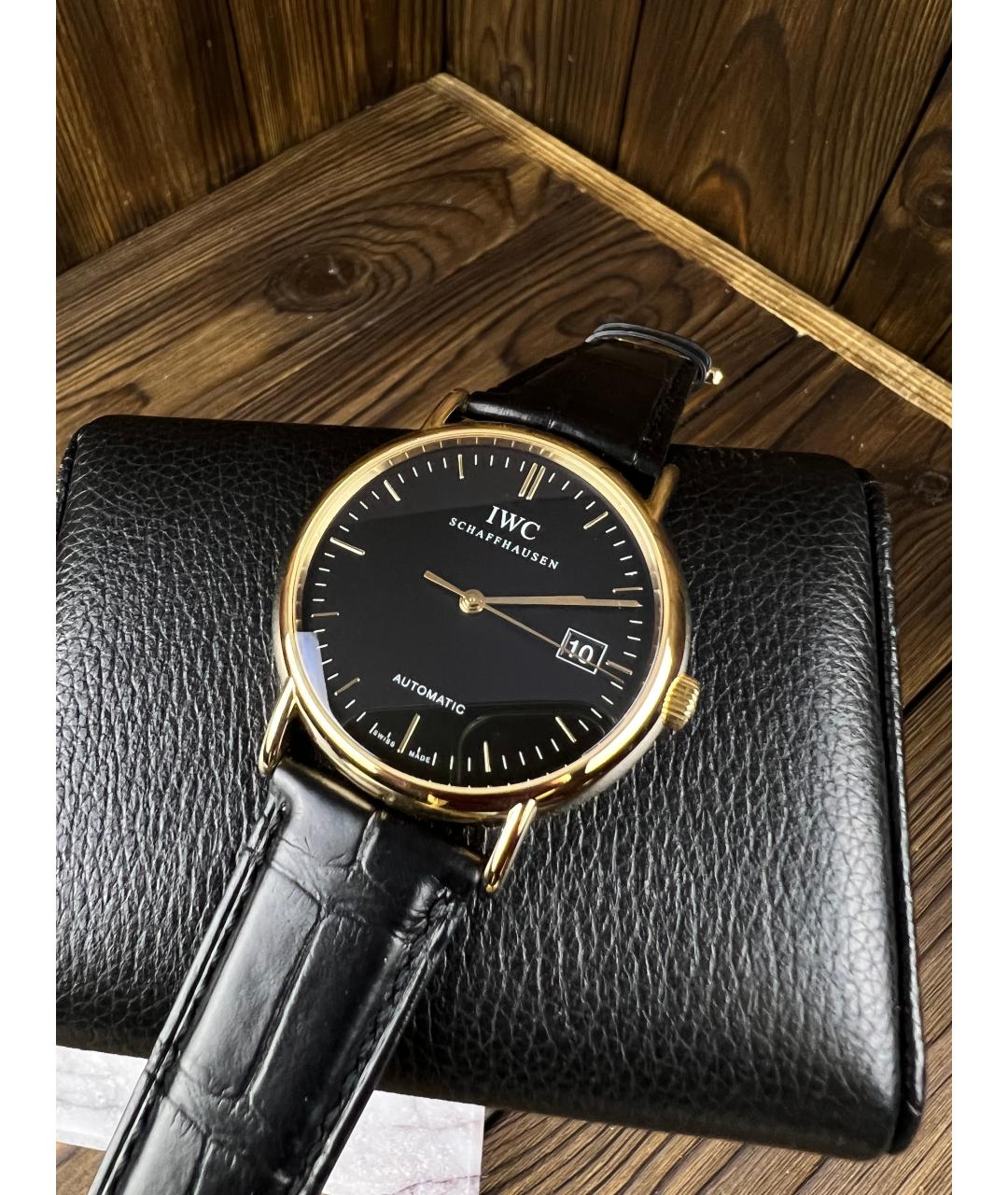IWC Черные часы из желтого золота, фото 3