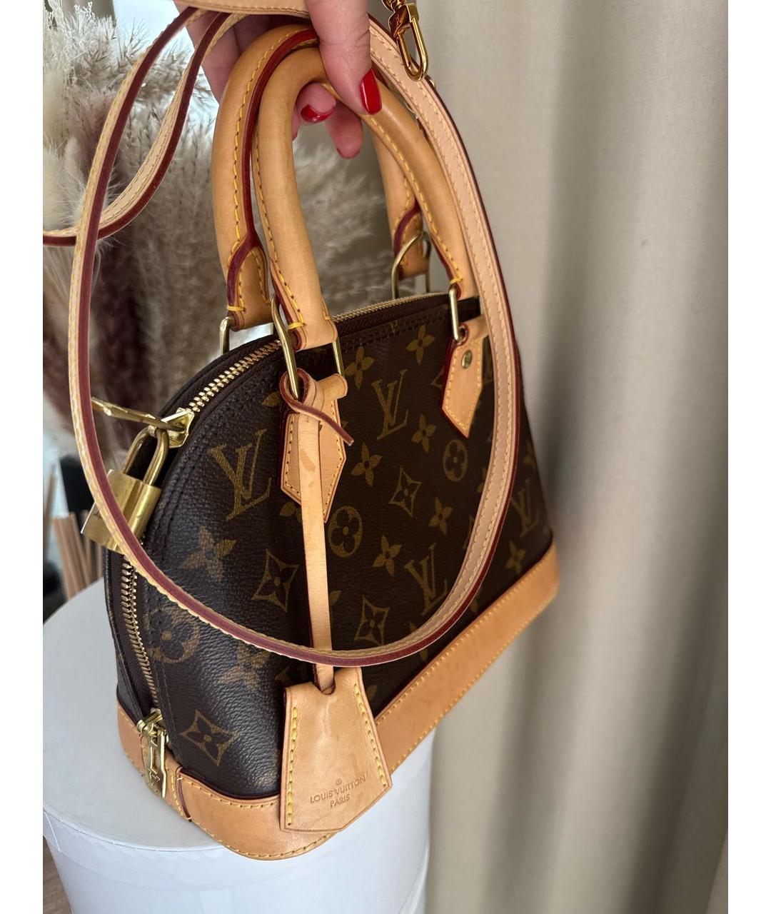LOUIS VUITTON Коричневая кожаная сумка с короткими ручками, фото 4