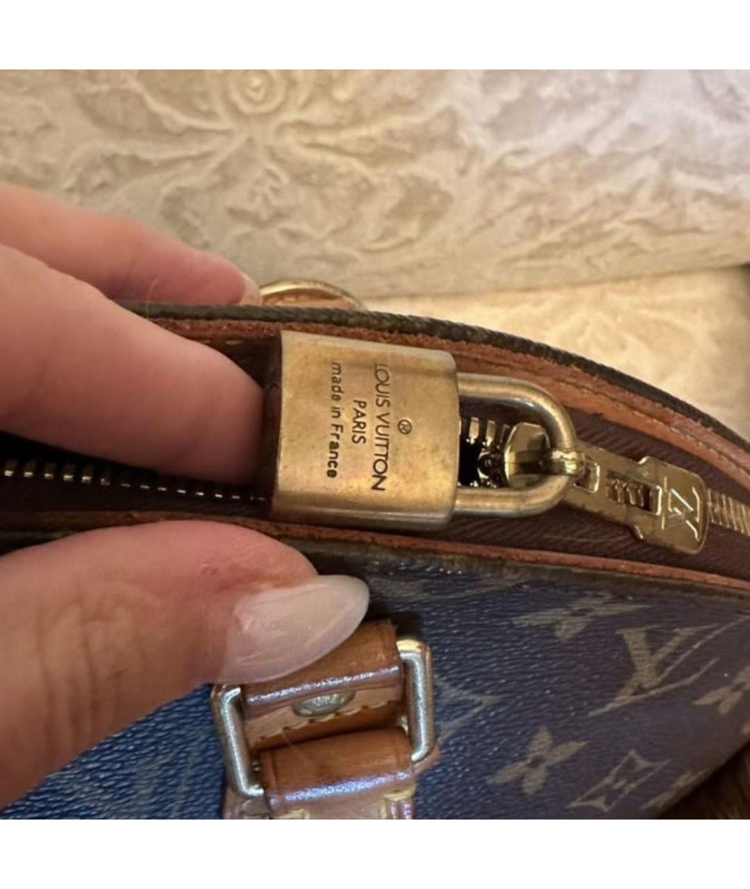 LOUIS VUITTON Коричневая кожаная сумка с короткими ручками, фото 6