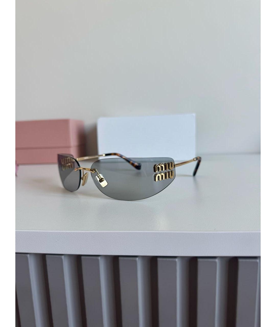 MIU MIU Голубые металлические солнцезащитные очки, фото 3