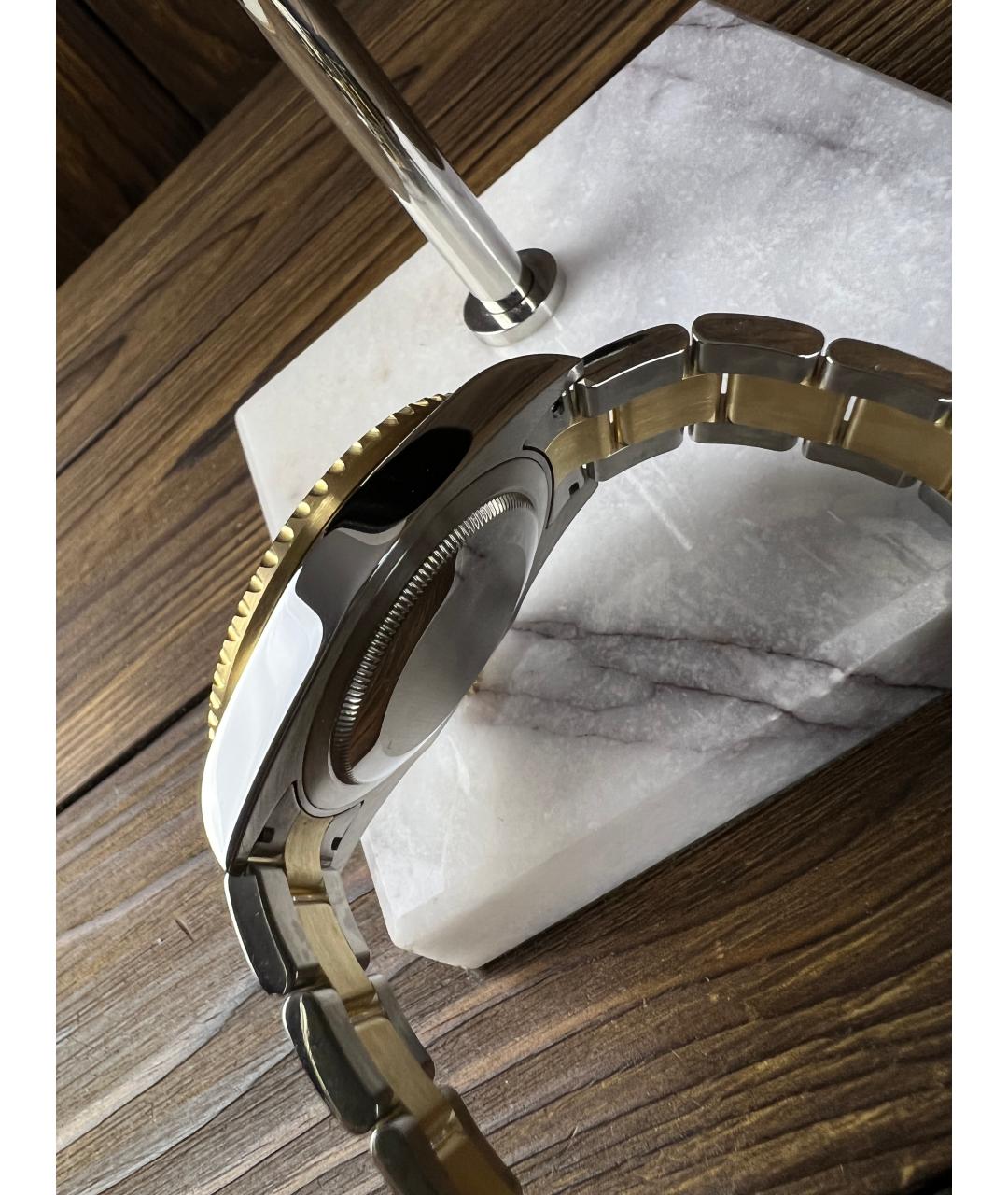 ROLEX Черные часы из желтого золота, фото 2