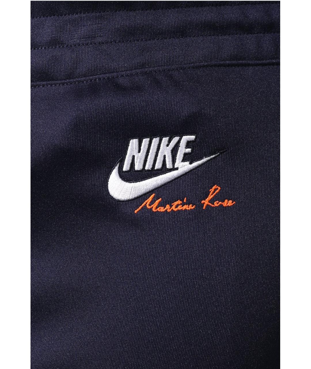 NIKE Синие полиэстеровые повседневные брюки, фото 3