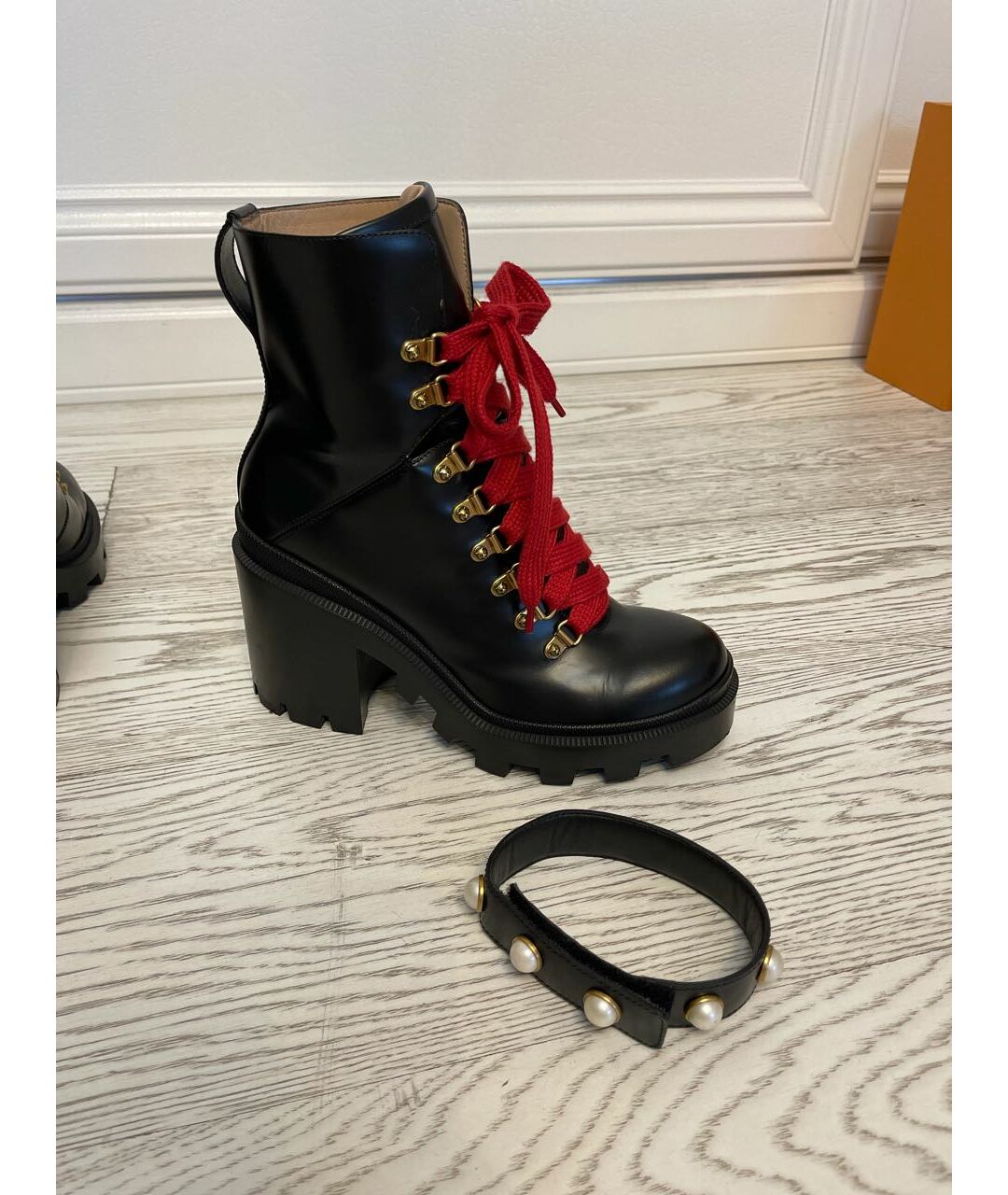 Gucci boots best sale with red laces