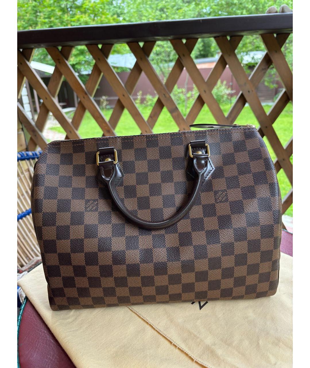 LOUIS VUITTON Коричневая сумка с короткими ручками из искусственной кожи, фото 9