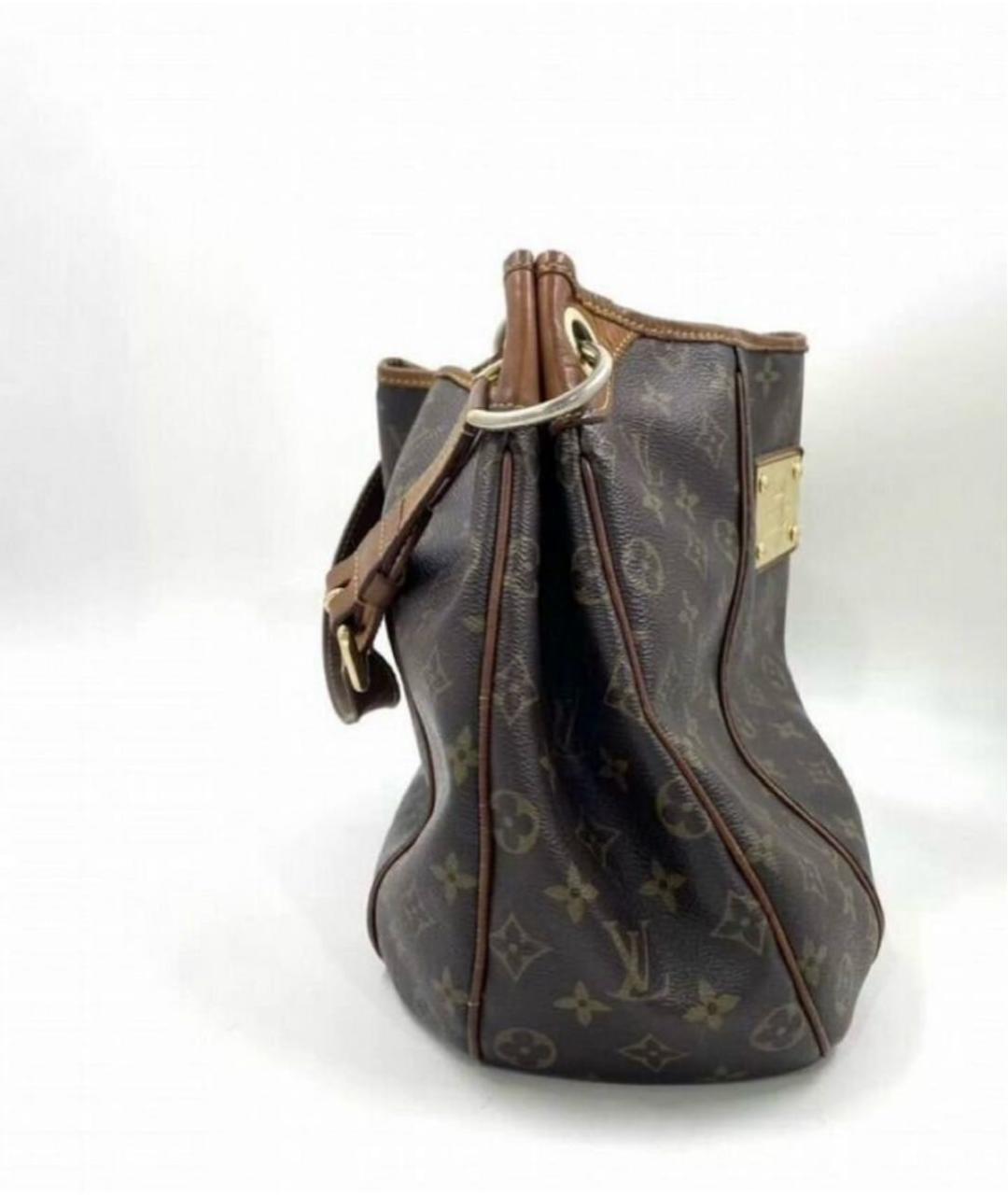 LOUIS VUITTON Кожаная сумка с короткими ручками, фото 4