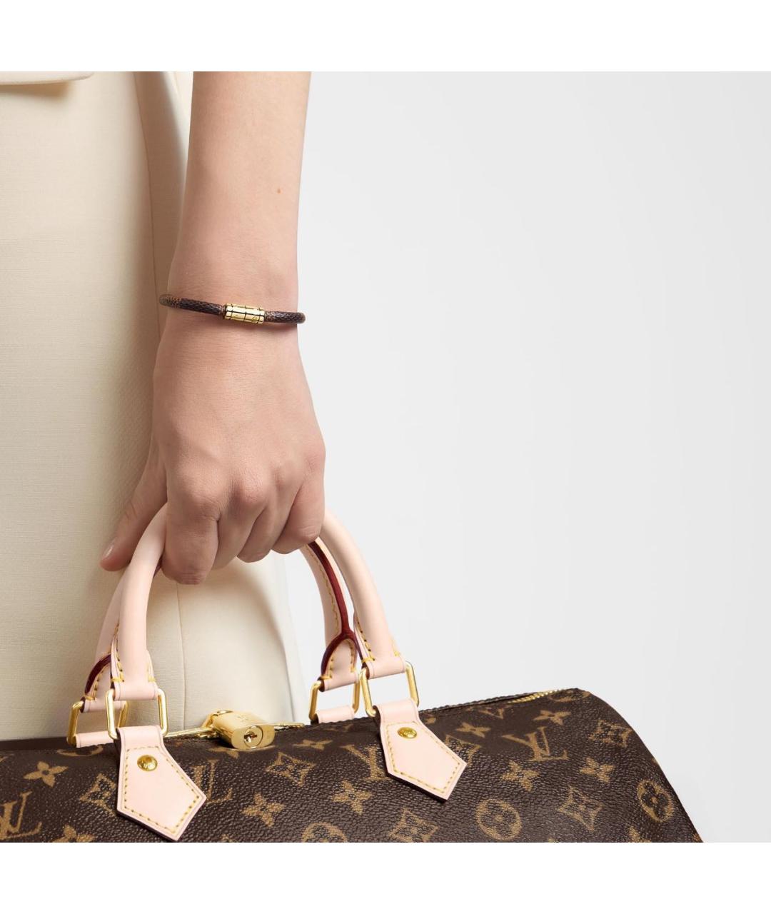 LOUIS VUITTON Коричневый кожаный браслет, фото 3