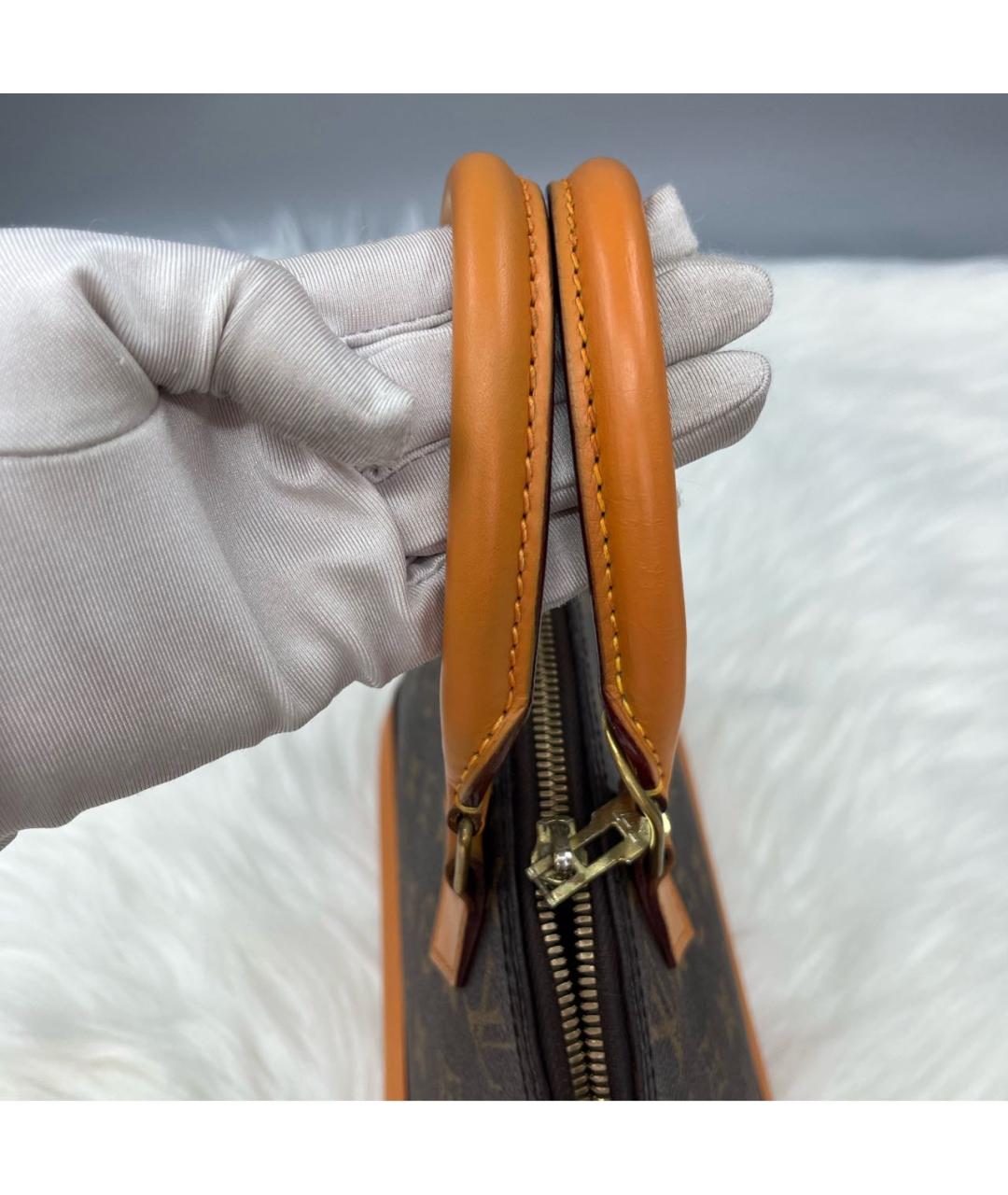 LOUIS VUITTON Коричневая кожаная сумка с короткими ручками, фото 7