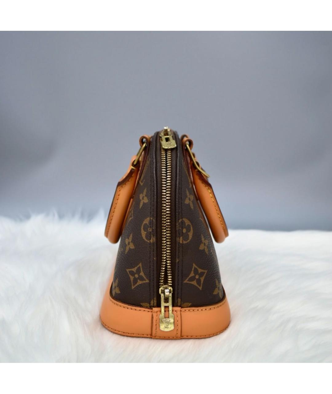 LOUIS VUITTON Коричневая кожаная сумка с короткими ручками, фото 4