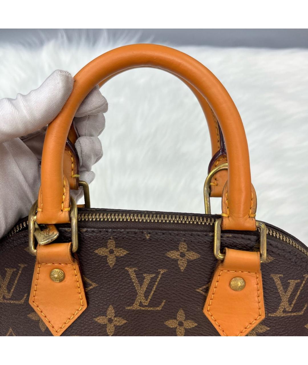 LOUIS VUITTON Коричневая кожаная сумка с короткими ручками, фото 6