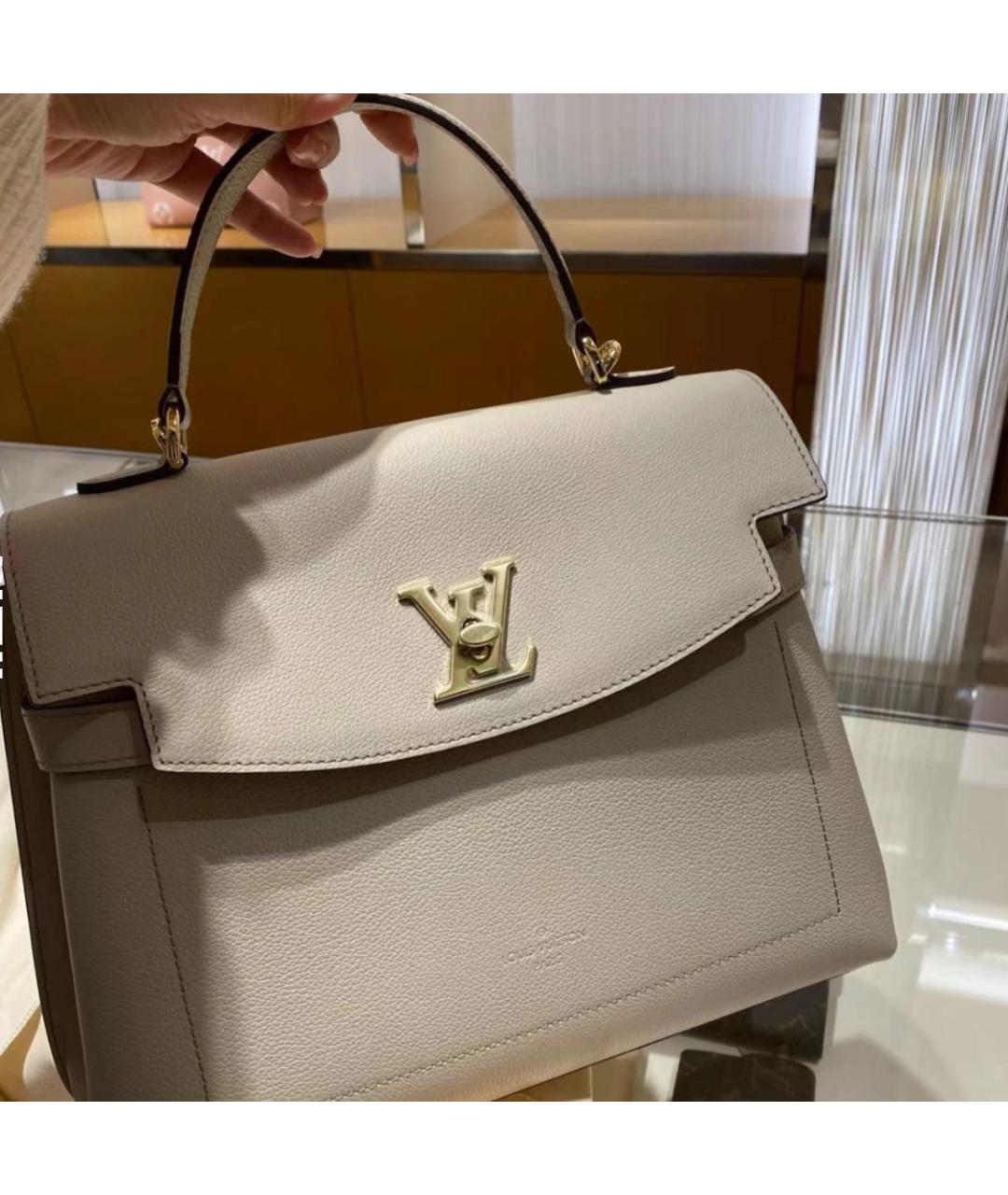 LOUIS VUITTON Бежевая кожаная сумка с короткими ручками, фото 4