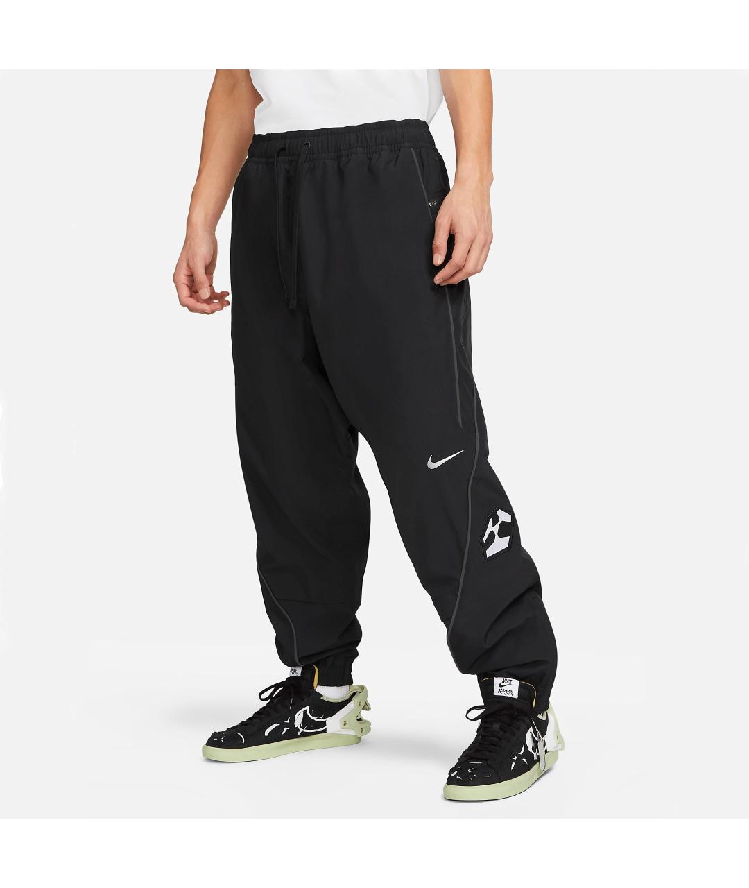 NIKE Черные полиэстеровые повседневные брюки, фото 7