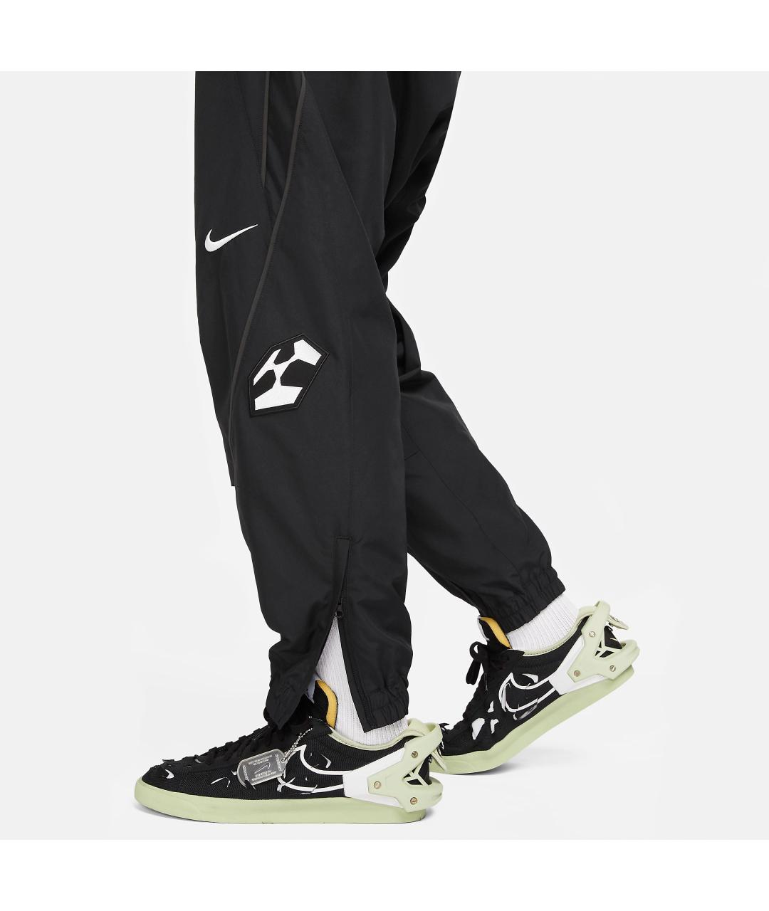 NIKE Черные полиэстеровые повседневные брюки, фото 9