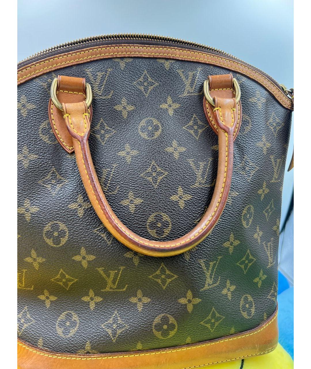 LOUIS VUITTON Коричневая кожаная сумка с короткими ручками, фото 3